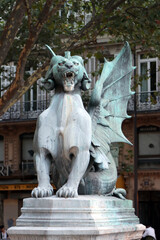 Saint Michel terrassant le Demon statue by French sculptor Francisque Joseph Duret that is located on Fontaine Saint-Michel in Paris, France 