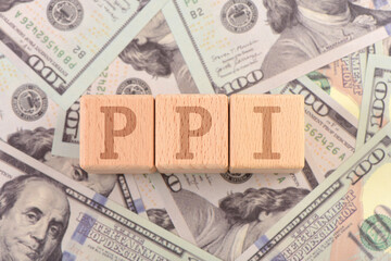 There are blocks with PPI letters printed on the US dollar props