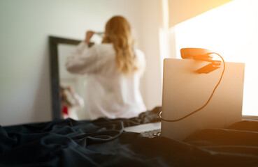Webcam model is getting ready for work.