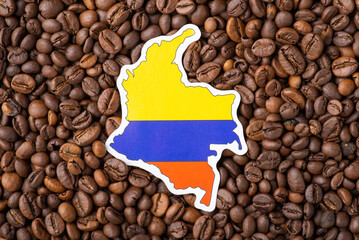Flag and map of Colombia in roasted coffee beans. Growing coffee in Colombia concept, origin of coffee grain