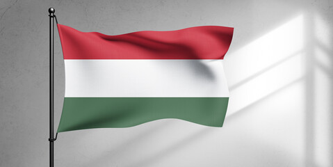 Hungary national flag cloth fabric waving on beautiful sky Background.