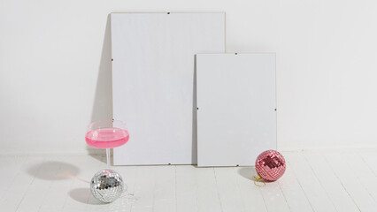 panoramic banner. two frame mockups with blank white sheets in a light studio