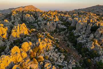 Unreal rock formation and landscape of Torcal de Antequera in Malaga, Andalusia, Spain. Aerial drone View