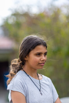 portrait of young aboriginal girl in vertical format with copy space