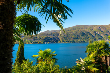 View to Lombardy in Italy and Lake Lugano with Mountain and Blue Clear Sky From Morcote, Ticino, switzerland.