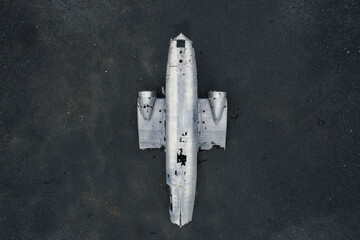 Crashed military DC 3 plane wreck on black sand beach in Iceland