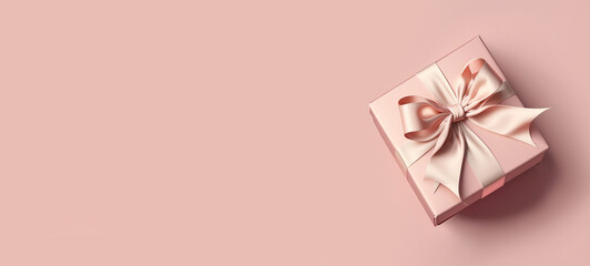 Pink gift box with satin bow on pink background. Banner, top view, space for text. Generative AI.