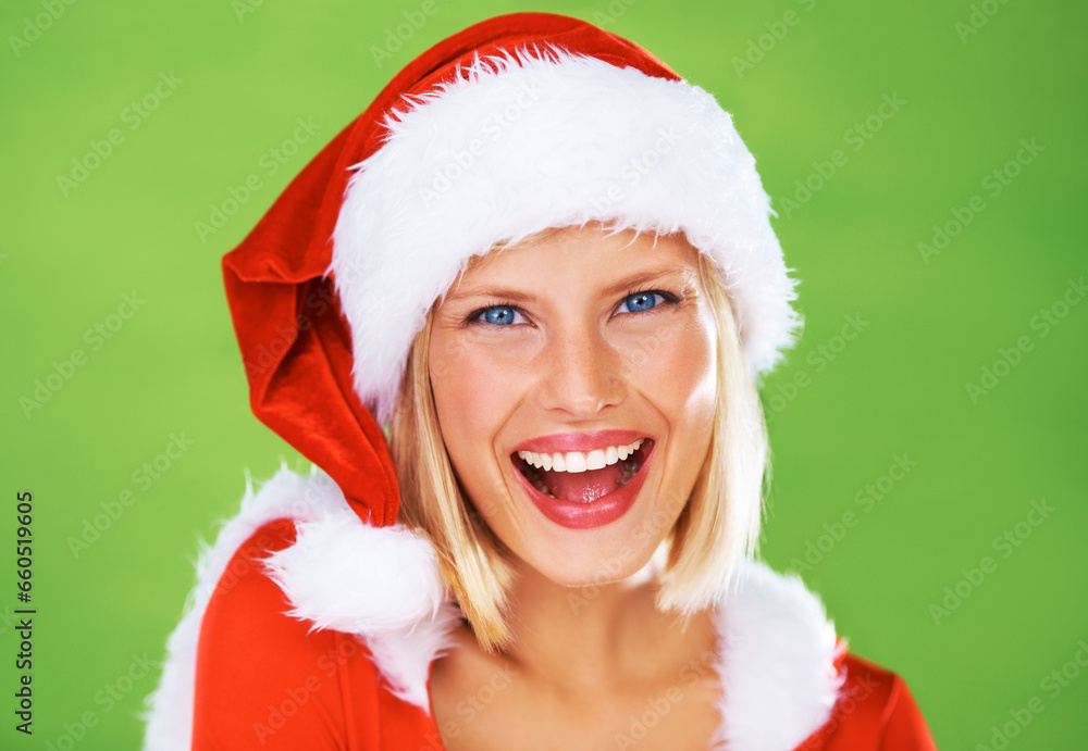 Poster Woman, Christmas hat and celebration in studio for season holiday, vacation happiness or fun fashion. Female person, smile and portrait in red costume or green background, winter break joy or excited