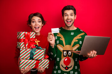 Photo of two impressed funky people hold pile stack x-mas eve giftbox debit card netbook online...