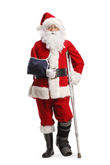 Santa claus with a foot brace and arm sling leaning on a crutch
