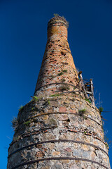 Lime kiln in sunny summer day, Vitini, Latvia.