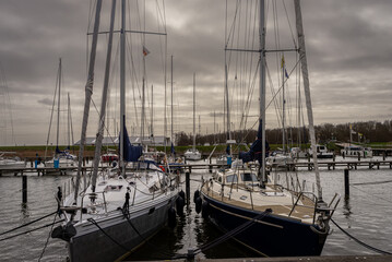 March 23, 2023. Medemblik, Netherlands, Marina with sailing ships in the Dutch city of Medemblik.