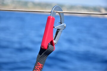 Moschettone, safety line barca a vela