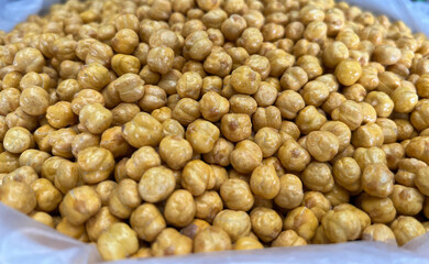Fried chickpeas on a market counter or oriental bazaar
