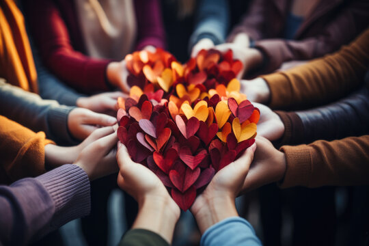 Diverse hands together forming a heart shape on Human Rights Day 