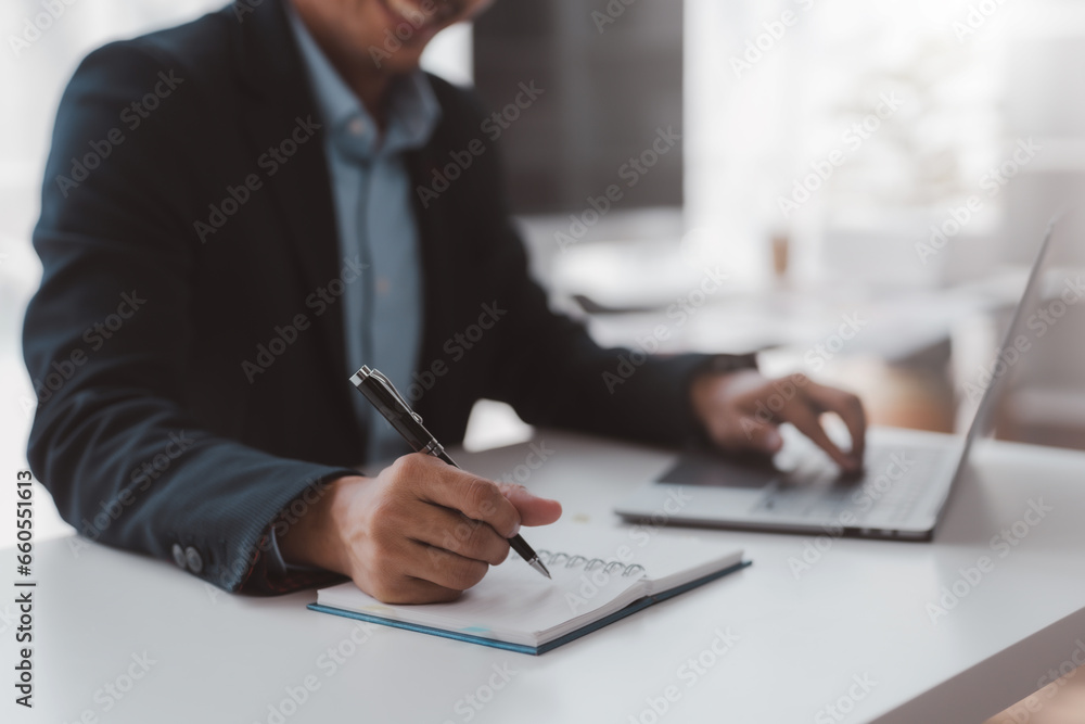 Poster closeup shot of businessman hand using pen and writing in notebook, presentation, working project at