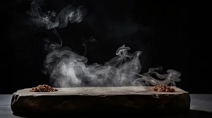 Tuinposter Smoke from incense sticks on a empty black stone table © jesica