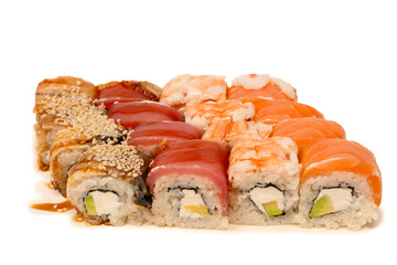 Sushi rolls with salmon, shrimp, eel, tuna.