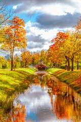 Cross Bridge in Alexander Park in golden autumn. Pushkin (Tsarskoe Selo)