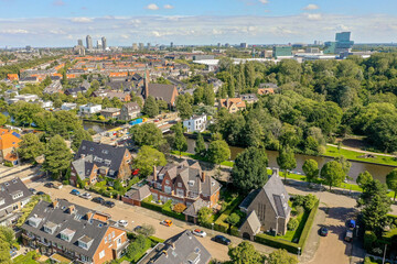 Fototapeta na wymiar an aerial view of some houses in the netherlands, taken from a drone - free flight over amsterdam's canals