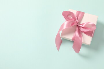 gift box with pink ribbon