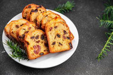Christmas fruit cake sweet pastry dried fruit cherrie, dried apricot, prune, raisin sweet dessert holiday treat new year and christmas celebration meal food snack on the table copy space food 