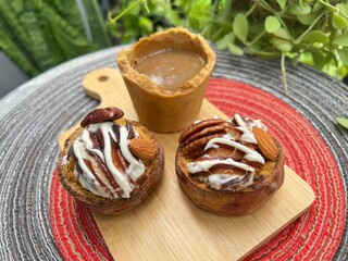 Eatable cup of Coffee and baked potatoes with chocolate mixed milk ice cream