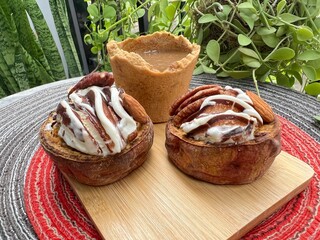 Eatable cup of Coffee and baked potatoes with chocolate mixed milk ice cream