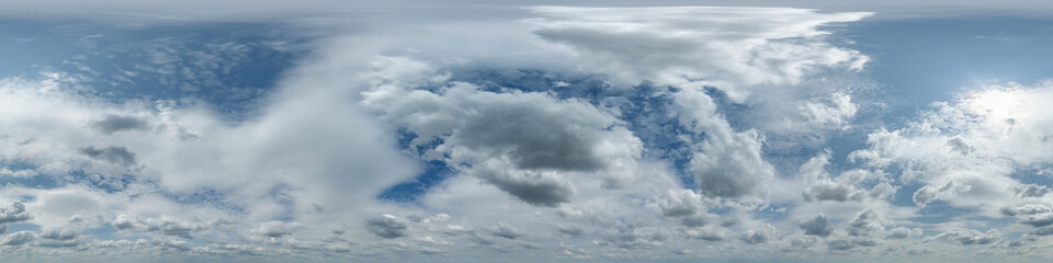 overcast blue sky with cumulus clouds as seamless hdri 360 panorama with zenith in spherical equirectangular projection may use for sky dome replacement in 3d graphics and edit drone shot
