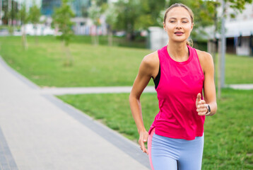 Beautiful woman running in an urban setting