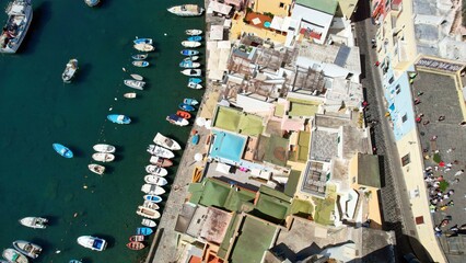 Procida - an aerial view looking vertically down over the Marina di Corricella - obrazy, fototapety, plakaty