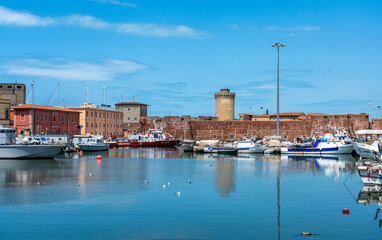 Scenic sight from the harbour of the city of Livorno on a summer morning. Tuscany, Italy. July-22-2023 - obrazy, fototapety, plakaty