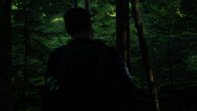 a man with a large backpack got lost in the forest