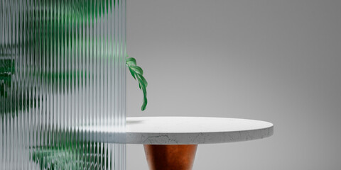Empty marble table and monstera leaves behind textured glass panel. Home interior showroom...
