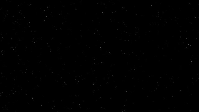 dust particles flying over a black background