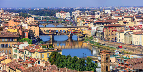 Italy, great landmarks and towns - city of art and culture-  Florence, panoramic view of city center and old bridge Ponte vechio