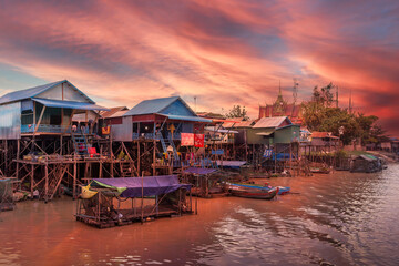 Fototapeta na wymiar Landscape with floating village on the water of Tonle Sap lake, Cambodia