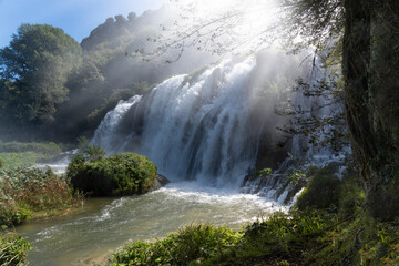 lower sector of the Marmore waterfalls with sunbeams