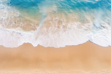 An Aerial View Of A Sandy Beach With Waves