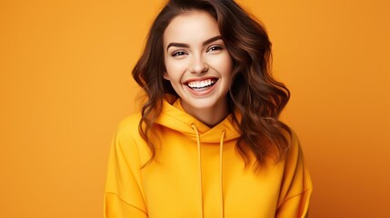 Happy beauty woman in orange color