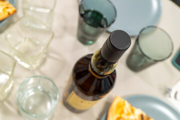 Bottle of whiskey on table. Selective focus