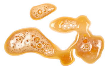 Spilled dark stout beer puddle  with foam, isolated on white, top view, clipping path 