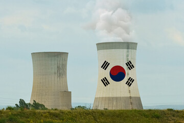 The flag of South Korea is depicted on the cooling tower of the nuclear power plant