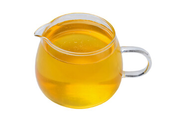 Acacia honey in a glass vessel. Acacia honey is one of the most useful and medicinal varieties of honey.