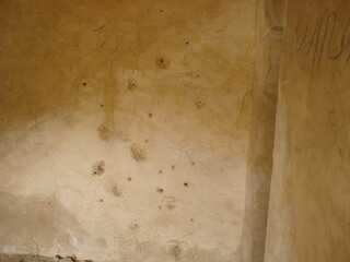 bullet holes of Iraqi shot against wall, Jonah's Monastery, Mosul, Iraq, 2006
