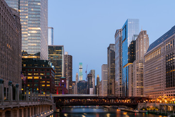 Fototapeta na wymiar Panorama cityscape of Chicago downtown and River with bridges at sunset, Chicago, Illinois, USA. A vibrant business neighborhood