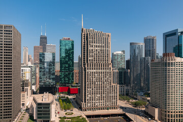 Naklejka premium Aerial panoramic city view of Chicago downtown area at day time, Illinois, USA. Bird's eye view of skyscrapers at financial district, skyline. A vibrant business neighborhood.