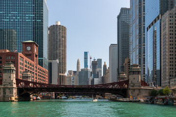 Fototapeta na wymiar Panorama cityscape of Chicago downtown and River with bridges at day time, Chicago, Illinois, USA. A vibrant business neighborhood