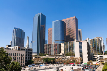 Fototapeta na wymiar Cityscape of Los Angeles downtown at summer day time, California, USA. Skyscrapers of panoramic city center of LA.