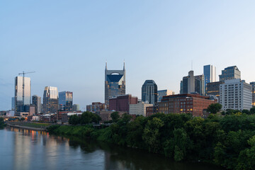 Fototapeta na wymiar Panoramic skyline view of Broadway district of Nashville over Cumberland River at day time, Tennessee, USA. This city is known as a center for the music industry, especially country music